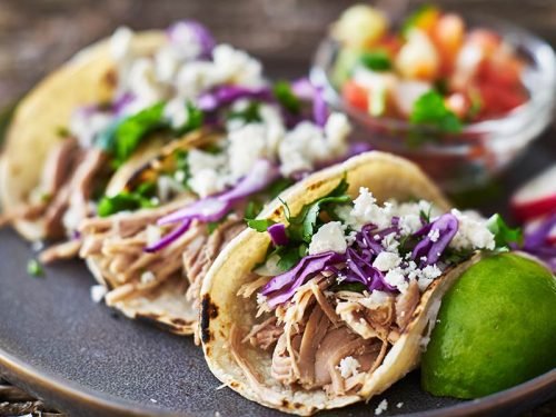 bigstock-Street-tacos-with-carnitas-225381346.jpg